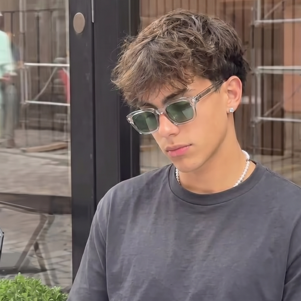 EYEKØNIK customer wearing eyewear